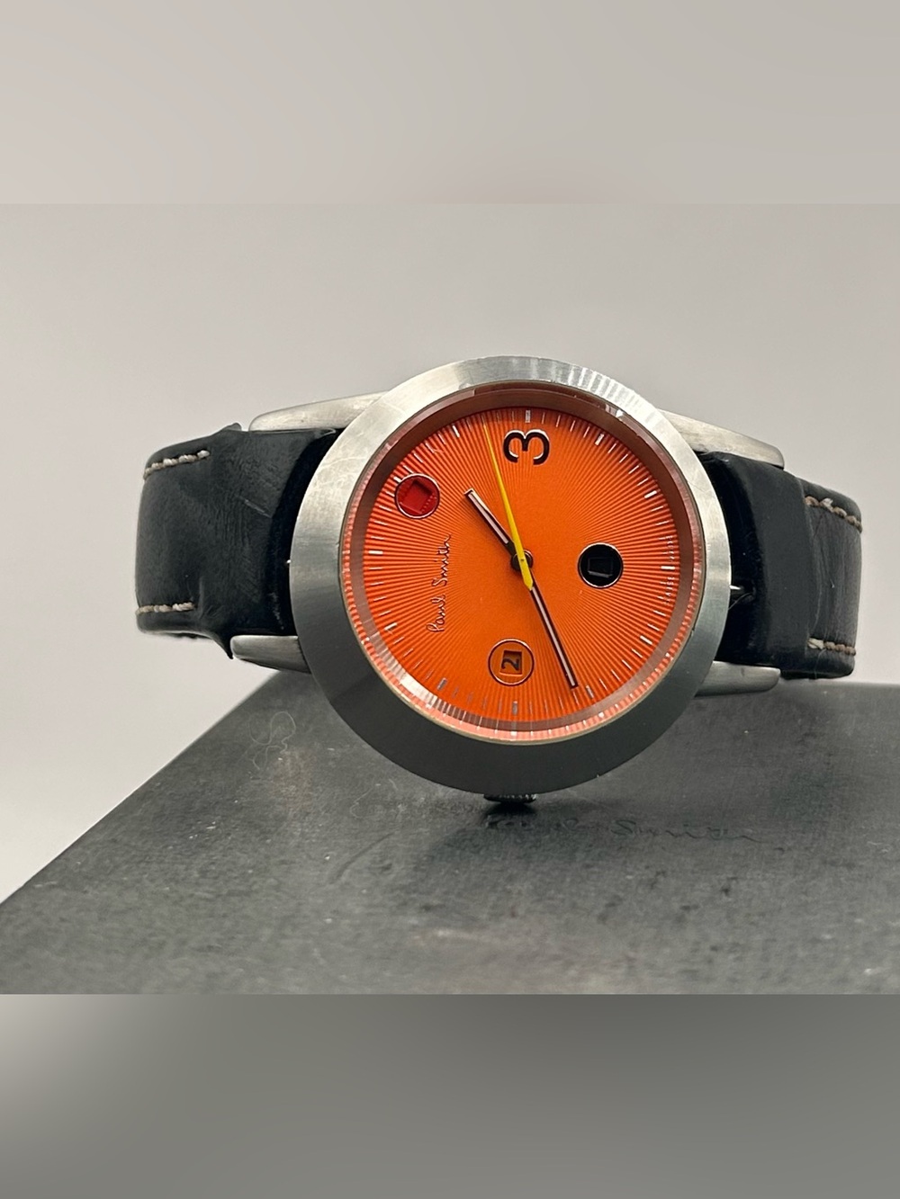 Paul Smith Jumping Date Men’s Orange Dial Black Leather Strap Quartz 36mm Watch
